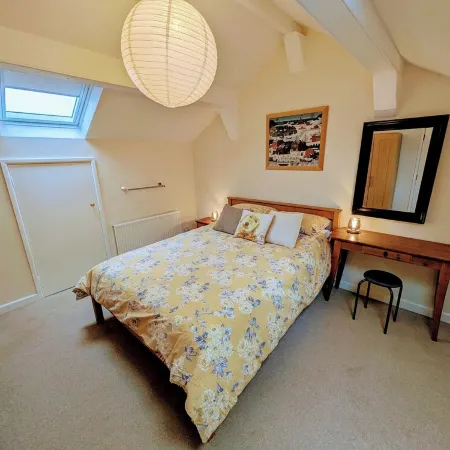 Cosy yet spacious property with private parking, close to the village centre.