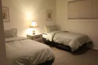 Two kitchens, patio, fenced backyard, and playground.