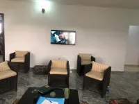 The Diasporan’s 2 bedroom Vacation Home rental . Hotels near Eleko Beach