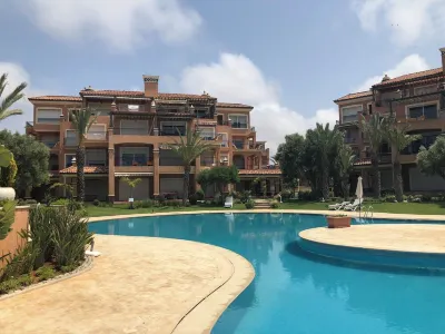 Résidence du Golf in Bouznika-Plage with 2 swimming pools; Hotels near Plage David