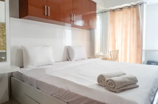 Compact and Cozy Studio Apartment at Orchard Supermall Mansion By Travelio