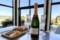 Coastal Calm | Luxe Stay with Views, Bath & Fire. - Apartments