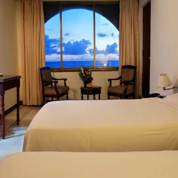 Paradise isle Beach resort pvt ltd Отели в г. Малп