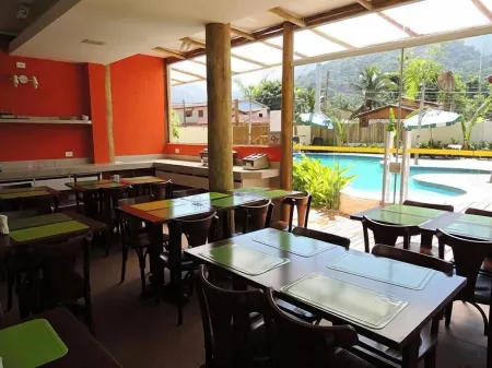 Beachcamp Maresias Отели рядом с достопримечательностью «Camping e Bar do Cacau - Praia de Santiago»