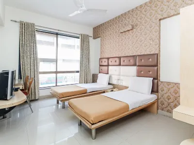 Hotel New Holiday Plaza Hotels near Purmepada Dam