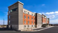 WoodSpring Suites Greeley Hotels near Greeley Commons Shopping Center