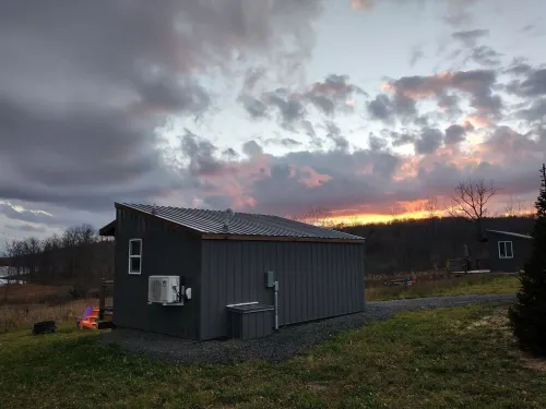 "Twins East" Waterfront property and micro cabin- 10 minutes from Watkins Glen!