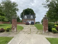 Historic Steckel carriage house with picturesque landscaping