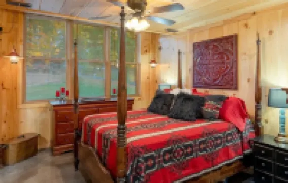 Red Cabin on Kentucky Lake.  Peaceful and pet friendly with a partial lake view.