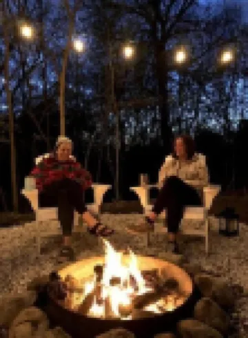 Charming Cottage with Hot Tub, Fire Pit, & Wooded Backyard