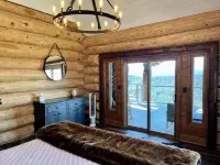 5500 sf cabin: 6 king/2 queen beds, heated pool/spa, game room, mountain views