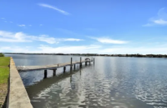 Waterfront condo & boat dock at the Heart of Palm Beach