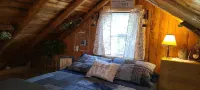 Wood Haven Lodge. Secluded, cozy log cabin in Northern Michigan.
