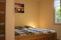 Bungalow "Morgenrot", 250m to the Müritz + boat mooring Hotels in Robel