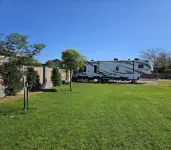 Cozy RV tucked back in a quiet property with plenty of room to relax