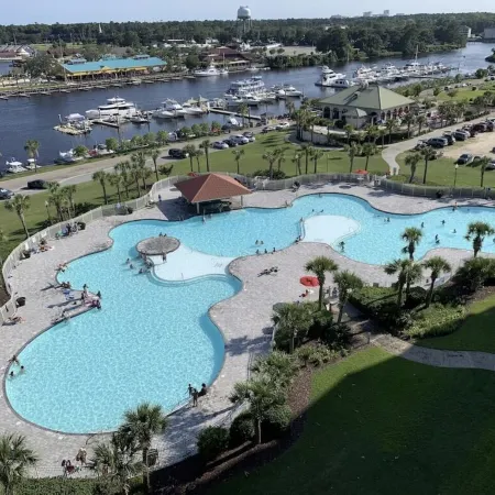 Modern Golf-View Condo • Barefoot Resort • Pools • Beach Gear Included