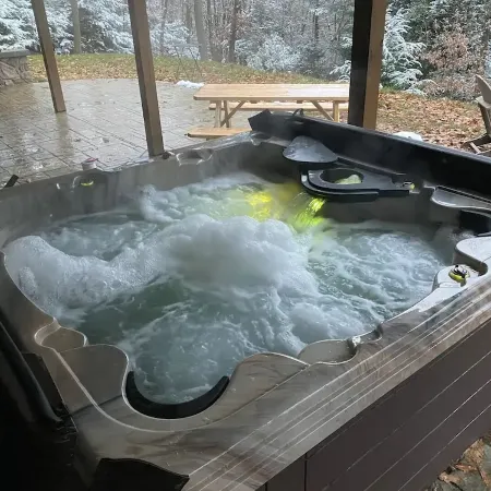 Cozy chalet with hot tub and ski resort view