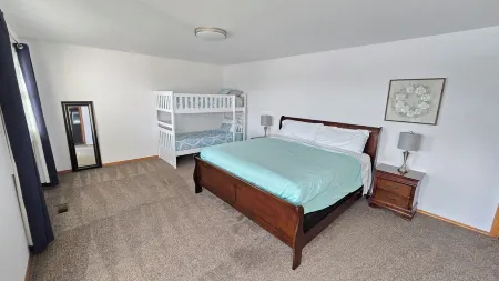 Spacious Lakehouse Getaway. Private Dock with large fenced Backyard and Gameroom