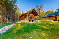 New dog-friendly cabin with river views, grill, modern interior, W/D, and AC