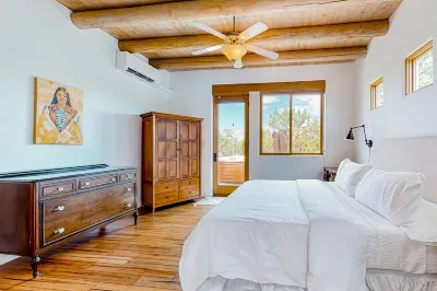 Idyllic mountain-view retreat with luxe interior & private sunset-view hot tub