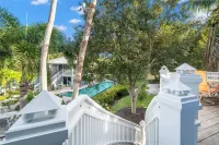 Community Pool Views and Spacious Verandas - Charming Island Retreat