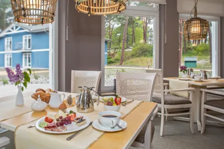 Hotel & Apartments Strandidyll Отели в г. Зауцин