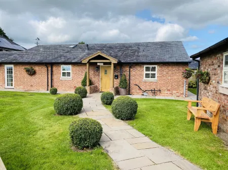 New Farm Cheshire B&B Отели в г. Пекфортон