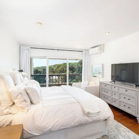 Malibu 2-bedroom designer furnished condo with AC. Central to everything!