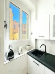 Cosy air-conditioned apartment near train station and beach ideal for families x1f30a;
