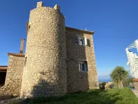 Rapunzel's tower stone house with incredible 180° sea view 5min drive to the beach