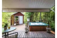 Cottage by River Falls with Hot Tub & Sauna