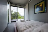 Swimming pool along the terrace, panoramic view surrounded by nature
