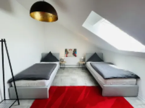 Bright, spacious attic apartment.