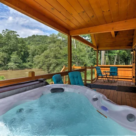 Deck & Hot Tub: Bryson City Riverfront Cabin!