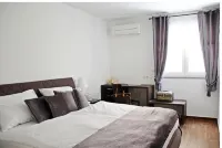 Casa Perisia - modern vacation apartment in a wonderful location with a view of the Adriatic Sea Hotels in Donji Seget