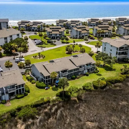 Steps from beach, Marsh Front, gated community, pool access, grill, marsh dock.