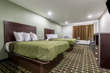 Scottish Inn and Suites Tomball Отели в г. Томбал