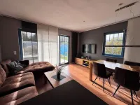 Modern, high-quality furnished vacation apartment to feel at home on Wangerooge 방어로게 호텔