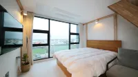 Jeju Woljeonghil Pension - Bungalows