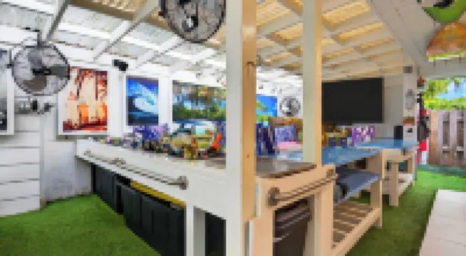 Swim Spa Retreat w/ Game Room, EV Charger, Near Las Olas Casa Pineapple Social by Avantstay