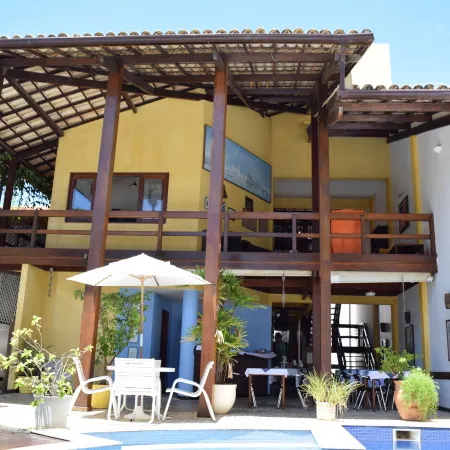 Hotel Pousada Encanto de Itapoan Отели рядом с достопримечательностью «Пляж Итапуа»