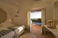 Herdade Do Touril Hotels near Ponte sobre o Rio Mira