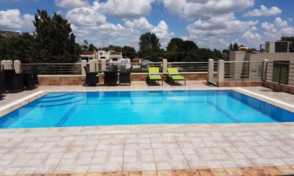 Magna Hotel and Suites