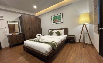 The Bedrooms Maeklong Service Apartment