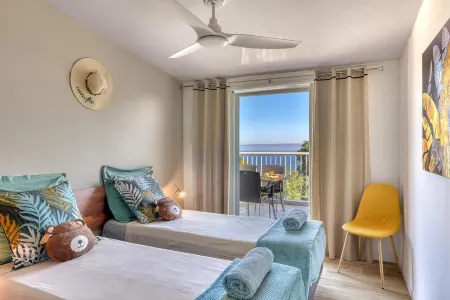 Villa Couleurs du Sud Sauvage Отели в г. Манапани-Ле-Бэн