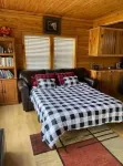 Forest Side Solar Powered Cabin with Nature Trails Hotels near Three Rivers Kayak, Canoe Rental, and Indoor Golf Simulator