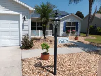 Paradise Village home in perfect golfing and recreation center location.