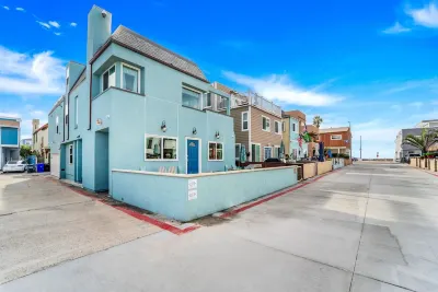 Chic 2BR Retreat - Steps to Beach, Exclusive Patio, Garage Parking