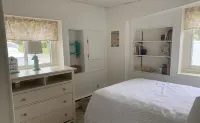 Private beach; firepit, outdoor shower, AC, two kitchens, laundry, covered patio