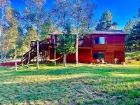 Cozy private mountain house on one acre. Private hot tub and pet friendly!